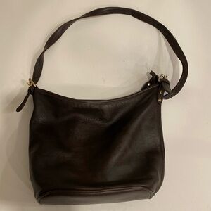 Good condition: Medallion brown leather purse